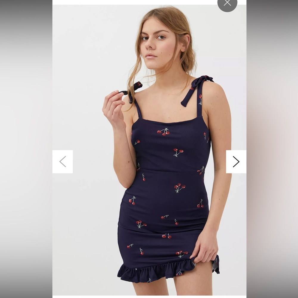 Urban Outfitters dress navy cherry pattern. Has tie shoulders straps size small